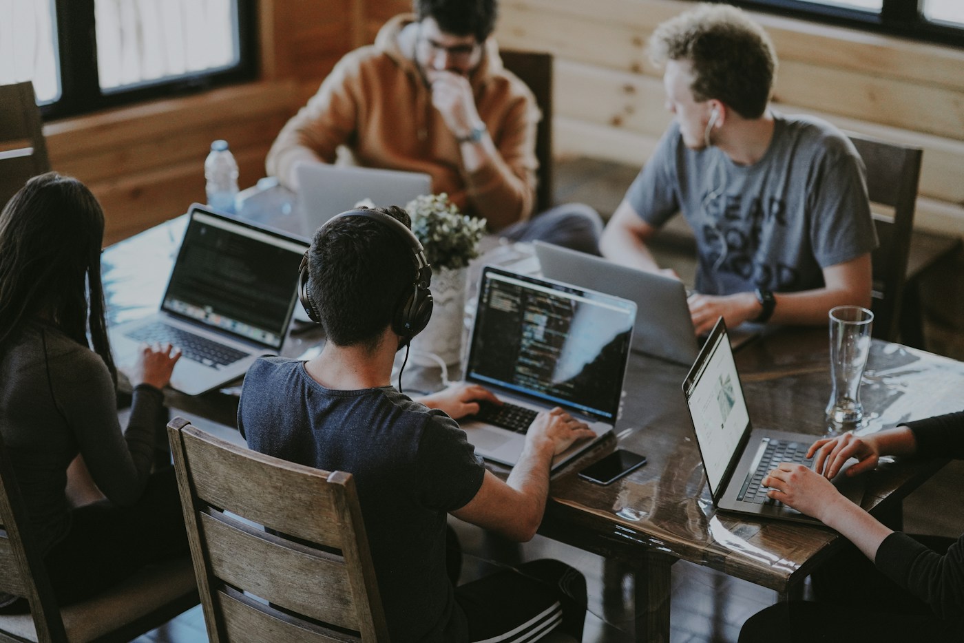 People sharing ideas around a table